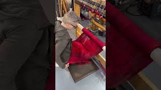 Weaver is cutting woven fabric off of the loom and making different items with it [upl. by Eveivenej767]