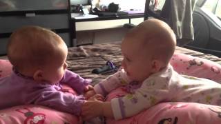 Twin babies talk and hold hands for the first time [upl. by Salkcin]