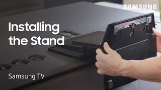 Unpacking and installing your 65” QN900 Samsung TV stand  Samsung US [upl. by Airpal]