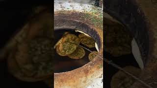 Naan bread baking in tandoor [upl. by Pelage]