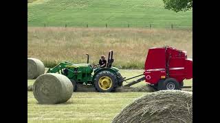 Second Cutting Round Bale Hay Two Tractors [upl. by Aetnahc956]