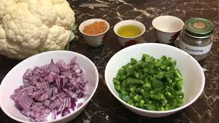 ዱለት ለምኔ  የአበባ ጎመን ዱለት  የፆም Cauliflower with green pepper onions HowtocookEthiopian dulet Vegan [upl. by Aliekat266]