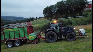 Black John Deere 6155R and John Deere 6210R in Norway Silage  Mowing [upl. by Kcirddor]