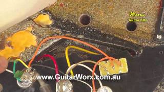 Grounding the bridge on a Flying V Guitar Kit  wwwGuitarCentrestore  USA Guitar Kits [upl. by Trstram145]