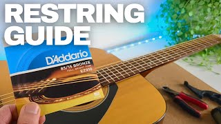 How to Restring an Acoustic Guitar StepbyStep Guide [upl. by Eenolem219]