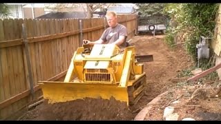 Mini Bull Dozer Struck Magna Trac Junior moving dirt [upl. by Saticilef844]