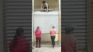 How to install a KENVO manual roller shutter door [upl. by Yruama518]