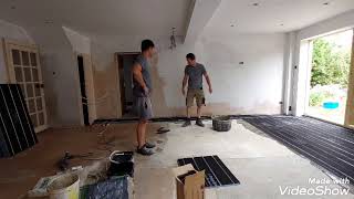 Installation of under floor heating Polypipe Overlay Plus panels and pipes for under floor heating [upl. by Lora]