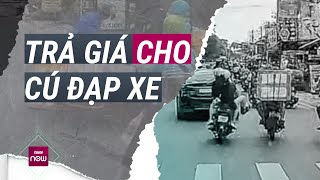 Đạp người chở hàng ngã sõng soài trên đường Hành vi côn đồ sẽ bị xử lý ra sao  VTC Now [upl. by Inilam]