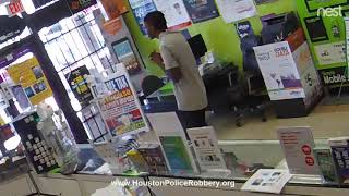 Watch robbery suspect pray after getting locked in store [upl. by Drofhsa]