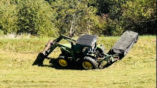 Kubota M6060 John Deere 1250 Massey 4707 mowing some hay [upl. by Jaquenette]