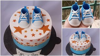 Baby shower cake decoration tutorial Baby shower cake with fondant baby shoe topper [upl. by Dlarej]