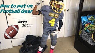 How to put on football gear  Football Swag  13U  Breast Cancer Awareness Edition [upl. by Lettie931]