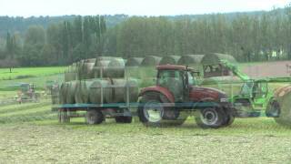 Andainage pressage amp enrubannage 2011 100 Case IHKrone  haymaking [upl. by Ylatfen457]