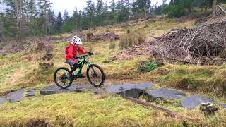 Cuda Impact Full Suspension 24 inch kids mtb review mountain bike in action over a rock garden [upl. by Giles]