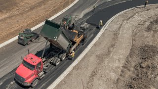 Cat AP1055F Asphalt Paver Paving Roundabout  Paver Machine  Drone View [upl. by Aifoz]