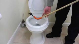 How to Unclog Toilet with Closet Auger  Plumbing Repairs [upl. by Allan404]