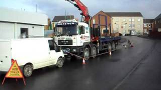 MAN fitted with FASSI FX600 crane lifting roof trusses at FULL REACH 100ft [upl. by Namyw385]