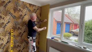 How To Hang The 1st Sheet Of Wallpaper On A Window Wall [upl. by Ailatan]