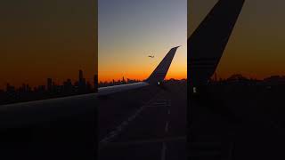 NYC Skyline Silhouette from Plane Window 🌅✈️ NYC SkylineSunrise PlaneTakeoff [upl. by Nev]