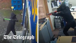 Masked attackers with shotguns smash computer shop with axes [upl. by Nolitta]