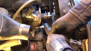 Diesel Mercedes cooling system can of worms part 4 water pump bypass tube and thermostat housing [upl. by Manley223]