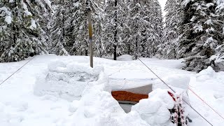 Winter Camping In Snow Shelter During A Storm [upl. by Sidras296]