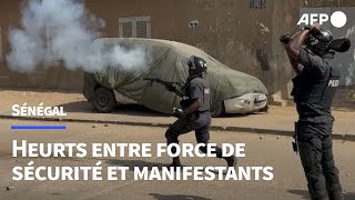 Sénégal  affrontements entre manifestants et forces de sécurité à Dakar  AFP Images [upl. by Salene]