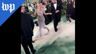 Elle Fanning side steps her way up Met Gala steps [upl. by Noivad]