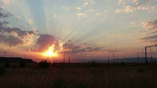 Romantic Sunrise Over Tranquil Landscape with Passing Train [upl. by Annael]