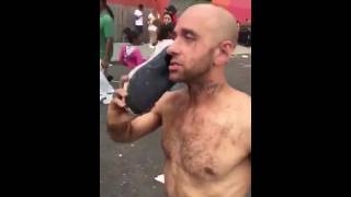 Drunk Guy At notting hill carnival is so wrecked he Talks to his Shoe [upl. by Viv]