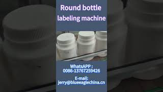 Round bottle labeling machine [upl. by Eimmat]