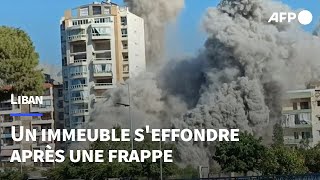 Liban un immeuble seffondre après une frappe au sud de Beyrouth  AFP Images [upl. by Putnem]