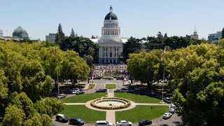 Drone video shows car protesters encircling Capitol to end coronavirus stayathome orders [upl. by Neelra40]