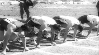 Dave Sime defeats Bobby Morrow in a track race in Big Springs Texas HD Stock Footage [upl. by Gathard]