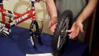 Childs Bike Assembly Fitting Front Wheel [upl. by Htenywg]