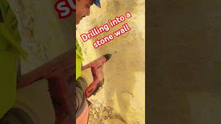 Drilling into a quarried stone wall shorts shortvideo [upl. by Nonah654]