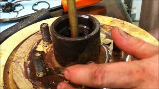 How to Grease Trailer Wheel Bearings with EZ Lube Grease Cert [upl. by Elbys687]