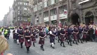 Massed Pipes amp Drums on Edinburghs Royal Mile [upl. by Eednac]