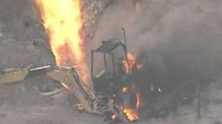 Backhoe ignites gasline fire [upl. by Flori95]