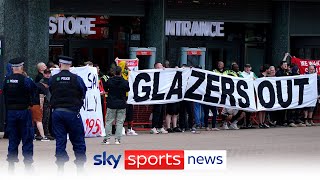 Fans block Manchester United megastore in Glazer protest [upl. by Ynar324]