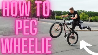 How To Peg Wheelie A Bike Easy way [upl. by Landmeier957]