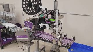 MFT Friction Feeder and IMPRESSO Labeler System  Feeding and Labeling Plastic Bags [upl. by Hosfmann]