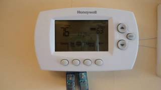 Cambiar de grados Fahrenheit a Celsius en un termostato Honeywell RTH6580WF [upl. by Netsrek]