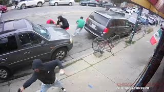 Chicago shootout that injured innocent bystander caught on video [upl. by Colinson711]