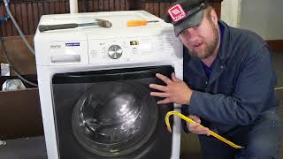 How to Unlock a Stuck Washing Machine Lid Lock [upl. by Metts]