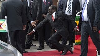 WATCH Robert Mugabe falls down steps in Harare [upl. by Aekin]