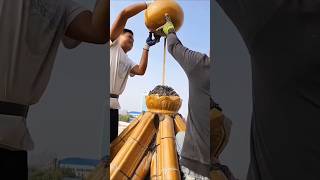 Installation process of gourdshaped decorative parts on the pavilion roof [upl. by Imerej]