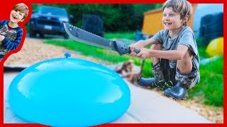 Machete Vs Giant Water Balloon in Slow Motion [upl. by Noyrb]