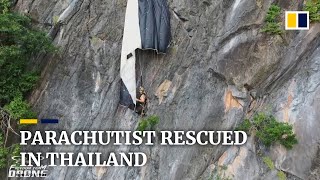 Austrian parachutist rescued after getting stuck on high cliff in Thailand [upl. by Ydaj492]